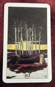 Photo of the 10 of Swords from the Robin Wood tarot