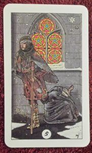 Photo of the Five of Pentacles from the Robin Wood tarot